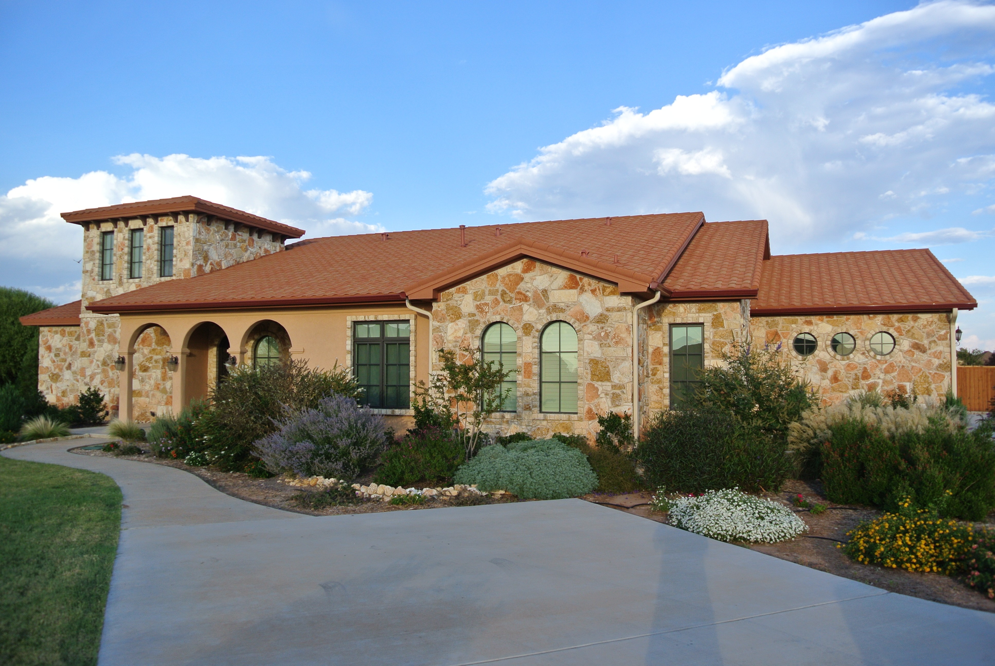 Gerard Barrel Vault Sunset Gold on Mediterranean stucco home